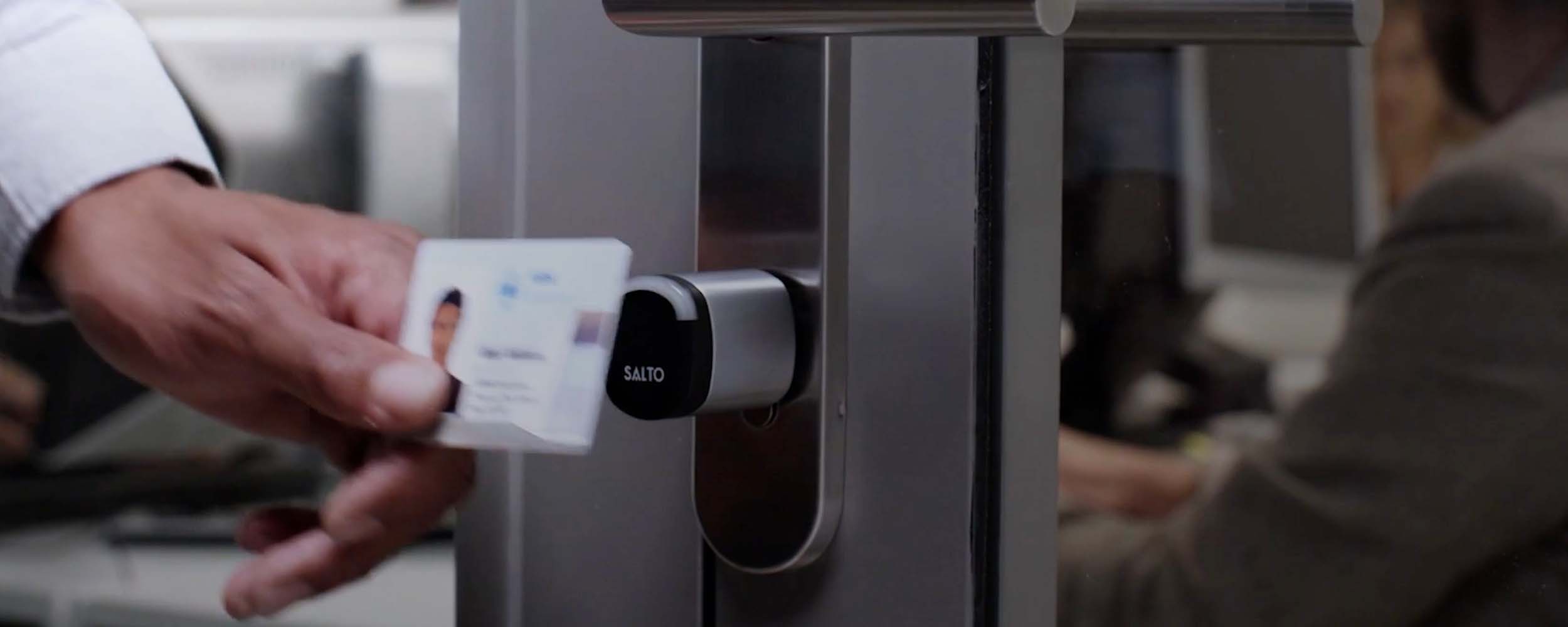 Office worker accessing a commercial building using a Salto Access Control System 